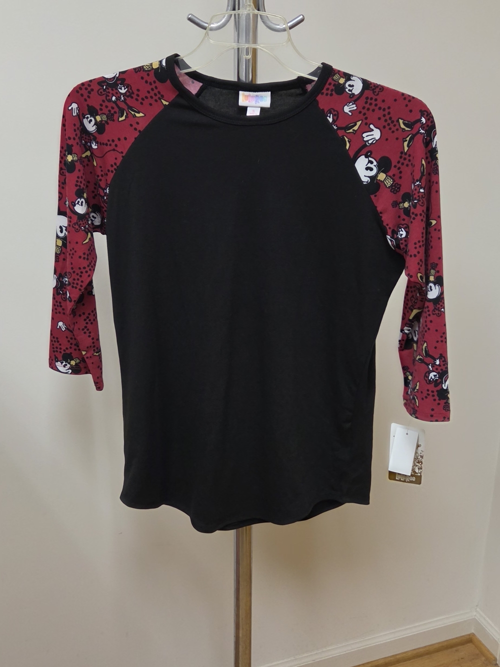 LuLaRoe Black Raglan Top with Burgundy Character Print Sleeves